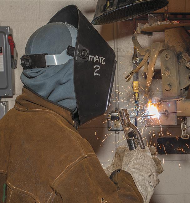 Derek Gross, Welding program student, practices his stick welding technique at the welding shop at the MATC Oak Creek campus. 