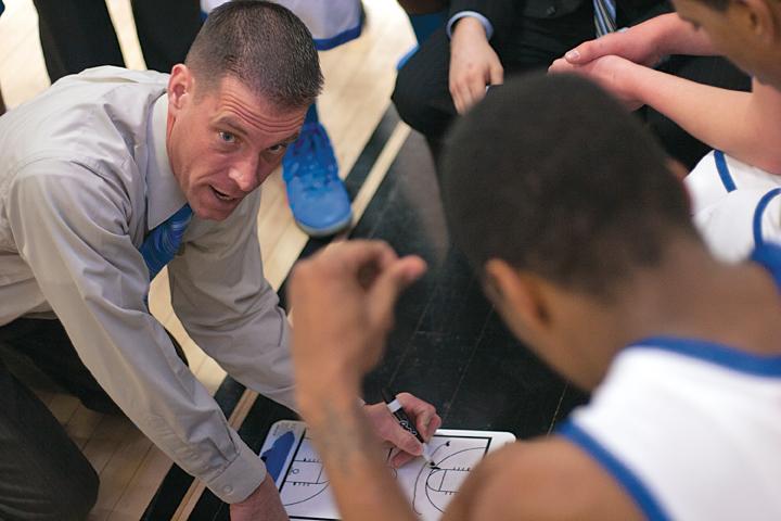 Darin Dubinsky/Times Stormers basketball coach, Randy Casey plans out his next play with the team during a game at Alverno College on Feb. 11.  