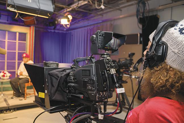 Savannah McKay preps the camera for Anthony Allen’s video interview in the MPTV studios at MATC’s Milwaukee campus. TV production students learn how to set up and produce video segments in MATC’s Television and Video Production program while working with MPTV.