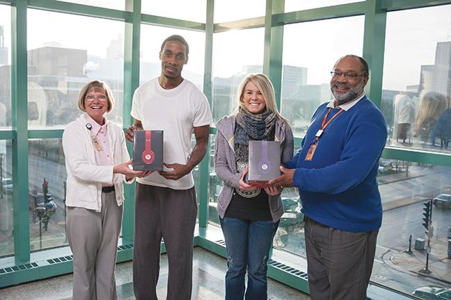 Carrie Schoner (L), director of Food and Beverage, presented Accounting student Harvey Williams a Beats headphone by Dr. Dre.Archie Graham (R), director of Student Life, also presented Dietetic Technician student Amanda Smith with a Beats headphone. Both Williams and Smith won the headphones as part of the Kick Start Your Day contest sponored by Pepsi and the MATC Food and Beverage department. Earlier contest giveaways included a backpack at the West Allis campus and a skateboard at the Oak Creek campus.