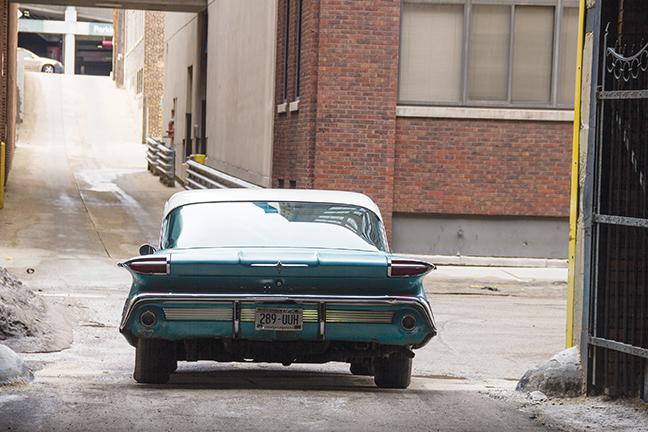 An+old+1950s+car+sits+in+the+alley+between+the+Main+and+Student+Center+buildings+of+the+downtown+MATC+campus+on+March+11.