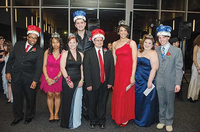 Ladies and gentlemen…your kings and queens of the Grand Ball. From left, Jarvis Harmon (West Allis), Antoinette Jackson (West Allis), Ericka Puzia (Oak Creek), Nikolai Monson (Oak Creek), Brian Galecke (Downtown), Brittany Lewis (Downtown), Lindsey Becker (Mequon) and Wilhelm Fehlhaber (Mequon).