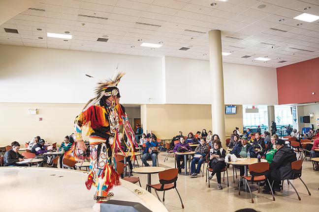 Ronnie Preston dances a traditional Apache dance with rings as part of International Ethnic Week.
