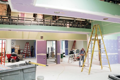 Wall - and ceiling - work in the final stages of completion.