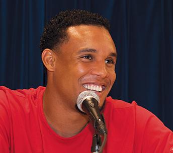 Carlos Gomez smiles as he awards scholarships to Hispanic students as part of the League of United Latin American Citizens (LULAC)/ Carlos Gomez Hispanic Scholarship on June 14 at the MATC Downtown Milwaukee campus.