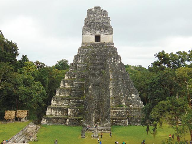 Tikal+was+an+ancient+capital+city+in+Guatemala+from+A.D.+200-900.++Temple+%231+reaches+up+154+feet.+Since+1956+the+University+of+Pennsylvania+and+the+Guatemalan+government+have+been+reclaiming+this+ancient+city+from+the+rain+forest.+Several+temples+remain+buried+by+rain+forest.+
