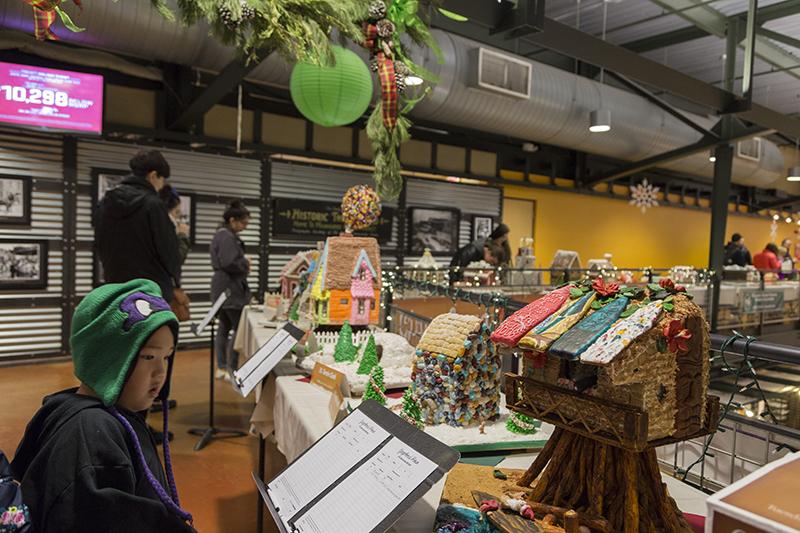 The Gingerbread Parade of Houses event, hosted by MATC Baking and Pastry Program, attracts visitors at the Milwaukee Public Market as they vote and bid on their favorite design of gingerbread houses made by students from December 4 through the 15th.