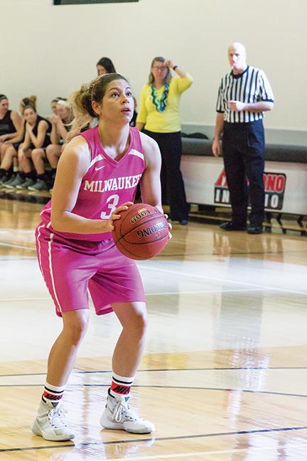 Ashley Oldenburg (3) shoots a free throw during the exciting victory over Madison College.