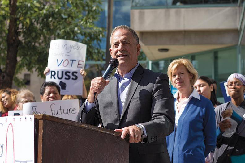 Russ Feingold, candidate for U.S. Senate, speaks at the Early Vote Rally, held outside the S Building at the Downtown Milwaukee campus U.S. Sen. Tammy Baldwin also attended the rally, which was sponsored by the Student Union Movement and the Latino Student Organization. Participants then marched to City Hall to raise awareness of the right to vote early.
