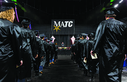 MATC graduates make their way to their seats in UW-Milwaukee Panther Arena during the college’s winter commencement ceremony on Dec. 16.