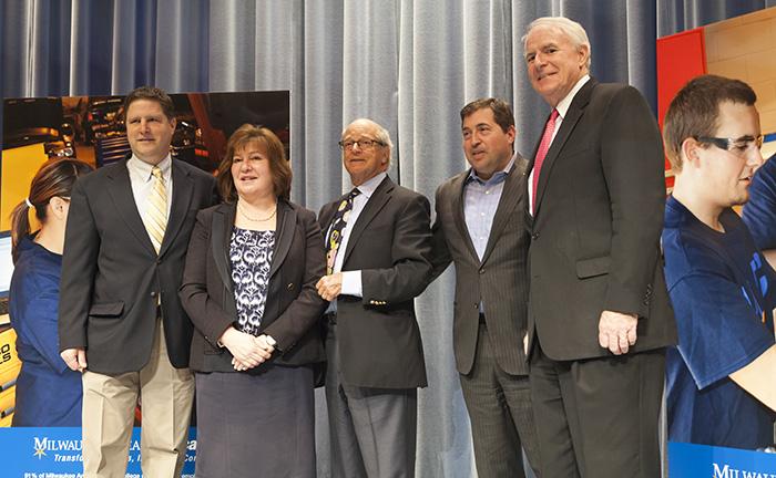 Steve Herrow, vice president and education director of ADAMM; Dr. Vicki J. Martin, MATC president; Tom Hurvis, Chairman of Old World Industries; Peter Feigen, Milwaukee Bucks president; and Tom Barrett, Milwaukee Mayor; gather after MATC receives $3 million grant.  The grant is going to expand the automotive programs and create the Al Hurvis/Peak Transportation Center at MATC. This is the largest private gift in the school’s history.