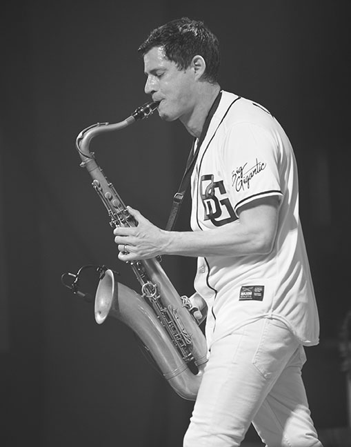Dominic Lalli serenades the crowd with his saxophone during the show.