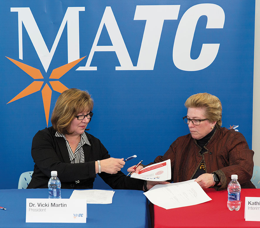 MATC President Vicki Martin and Cardinal Stritch University Interim President Kathleen Rinehart sign an articulation agreement that will provide MATC nursing students the opportunity to concurrently enroll at Cardinal Stritch University and earn a bachelors degree in as little as one semester after earning an MATC associate degree in registered nursing.