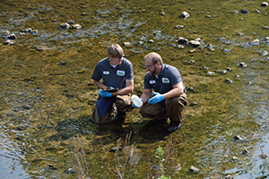 James and Andy collect samples at the Cedar Creek Water Quality Compliance.