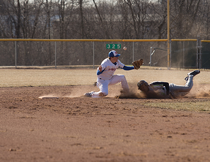 Stormer second baseman Andrew Wilson attempts to tag out the opposing runner.