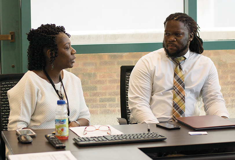 Interim Director of Student Life Jeannie Bynum (L) helps newly hired Director of Student Life Equan Burrows get up to speed at MATC.