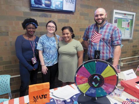 Mequon Student Government members celebrate Constitution Day on Sept. 18 with flags and stickers to students. The students also had an opportunity to win prizes by spinning the wheel.