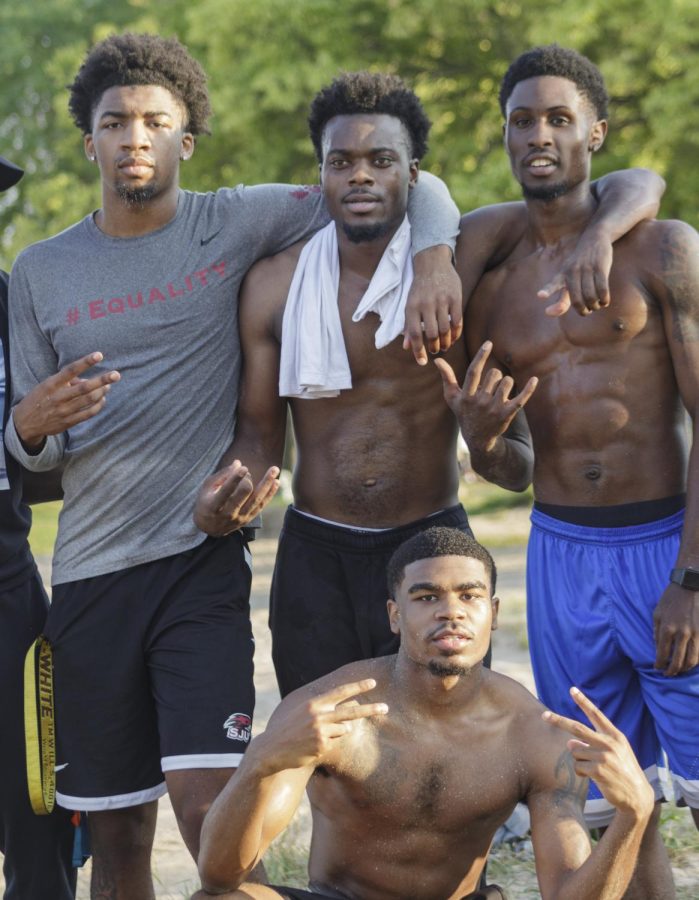 After practice relief for mens basketball players l-r, including Jalen Scott and  Chima Nwosu, 