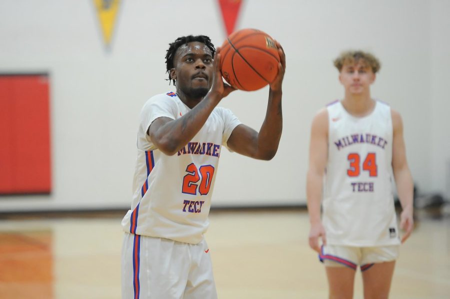 Karl Blanton Jr (20) poised to hit a free throw as point guard Erik Victorson (34) looks on. Blanton led all scorers with 24 points in the Stormers 128- 83 win over the McHenry County College Scots.
The Stormers will play the Braves of Black Hawk College on Saturday, March 5 for the Region IV Championship at Alverno's Reiman Gymnasium. Tip-off is at 3 p.m.