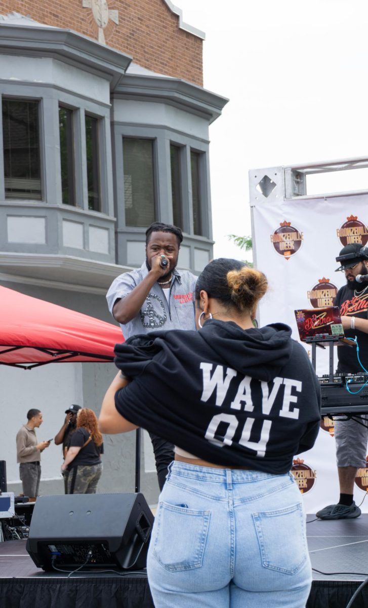 A Wave Chapelle fan wears his merchandise while he performs on the main stage at the Bronzeville Cultural & Arts Festival in Milwaukee on August 6.