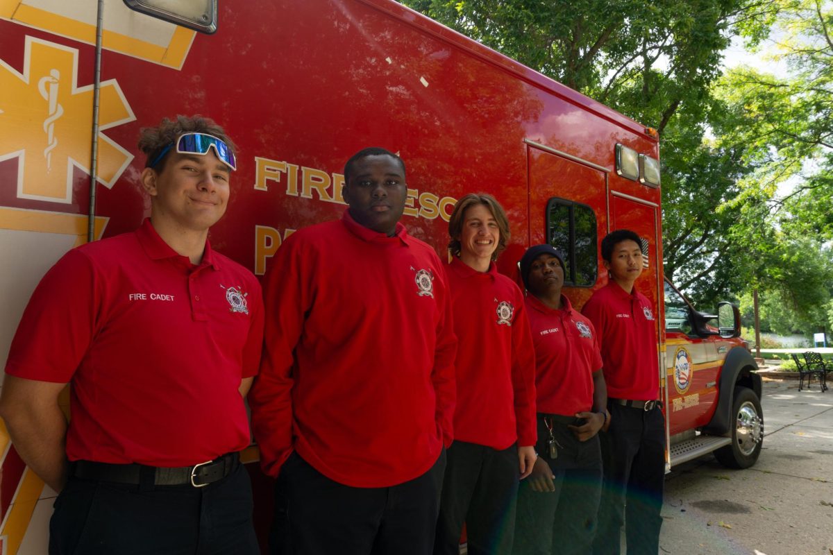 Some EMT students posed in front of their stationed ambulance on the Oak Creek Campus.