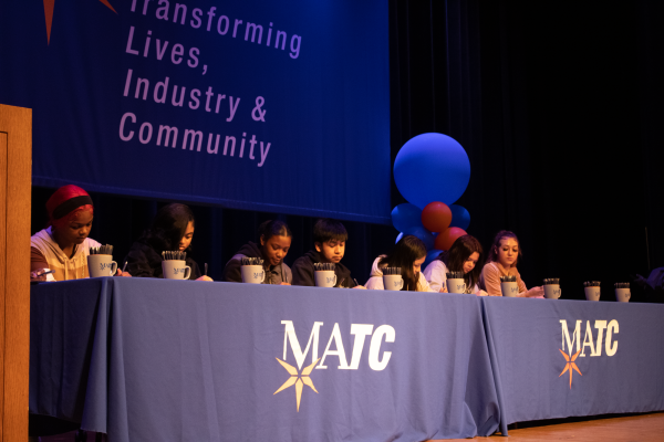 A glimpse of Senior Signing Day in MATCs Cooley Auditorium where high school seniors filled the tables on stage and signed their letters of intent (LOI) to attend MATC in the Fall of 2024. Students went onto the stage based on the Pathway they intend on enrolling in.