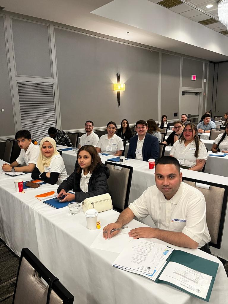 MATC Student Organization leaders from the Rohingya Student Association, Mothership and District Student Association pose for a photo during a conference. 