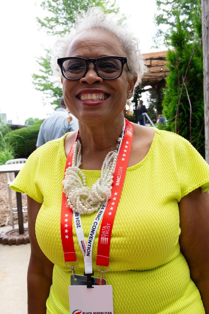 Dr. Joann Fisher, war veteran and advocate for women and male war vets, poses for a picture at an RNC event in Milwaukee.