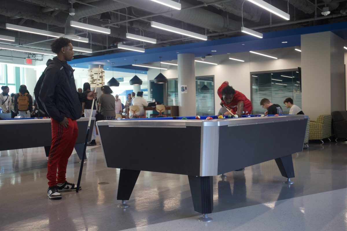 Students played pool, foosball and ping pong at the first Wild Out Wednesday event at the new 3rd floor Student Lounge at the Downtown Campus. 