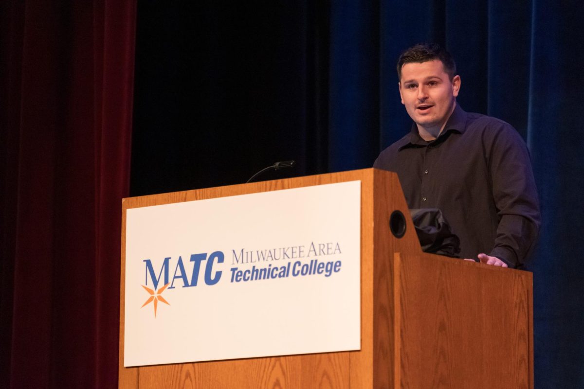 MATC student, and Times Managing Editor, Warren Murphy introduces MATC President Dr. Anthony Cruz to faculty at a Coordination Day event. (Photo courtesy of Tim Evans, MATC Marketing and Communications.)