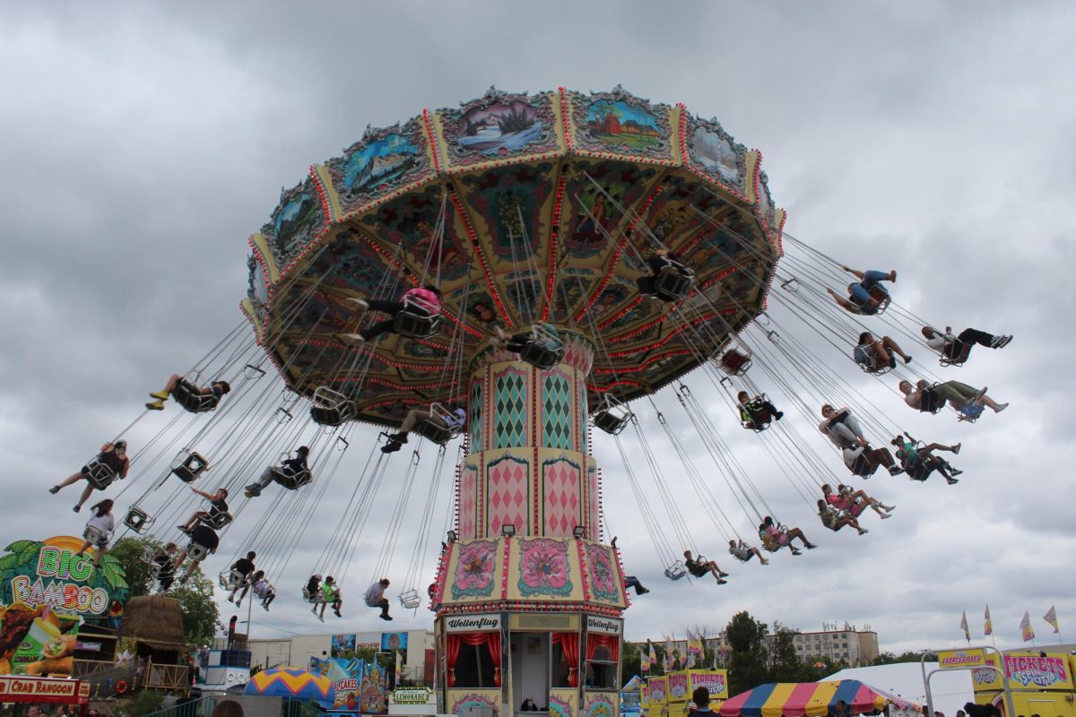 Fairgoers enjoy a ride in Spin City at the Wisconsin State Fair.