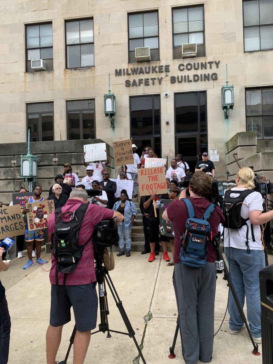 Protesters gather outside of the Milwaukee County Safety Building on August 5, 2024.