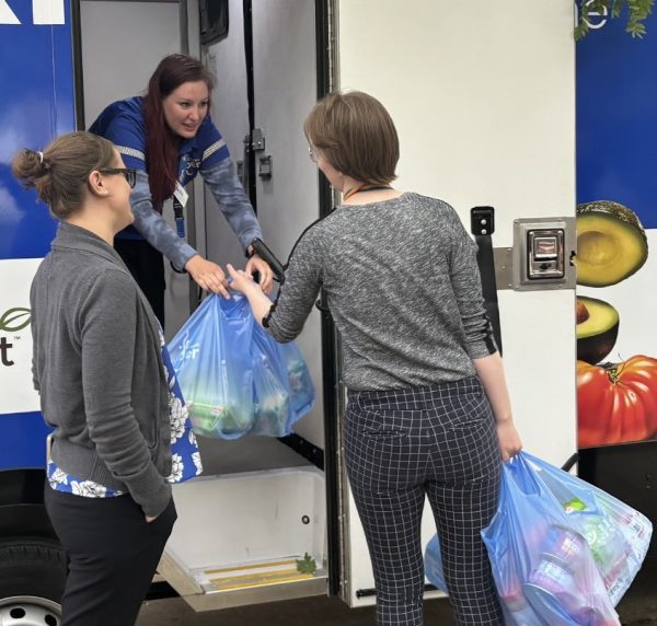 Bags of non-perishable food items from Kroger were given to the Downtown Campus Food Pantry at an event that celebrated the new free, on-campus grocery delivery service.
