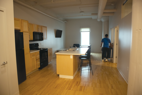 A shared kitchen area outside of rooms at Westown Green apartments