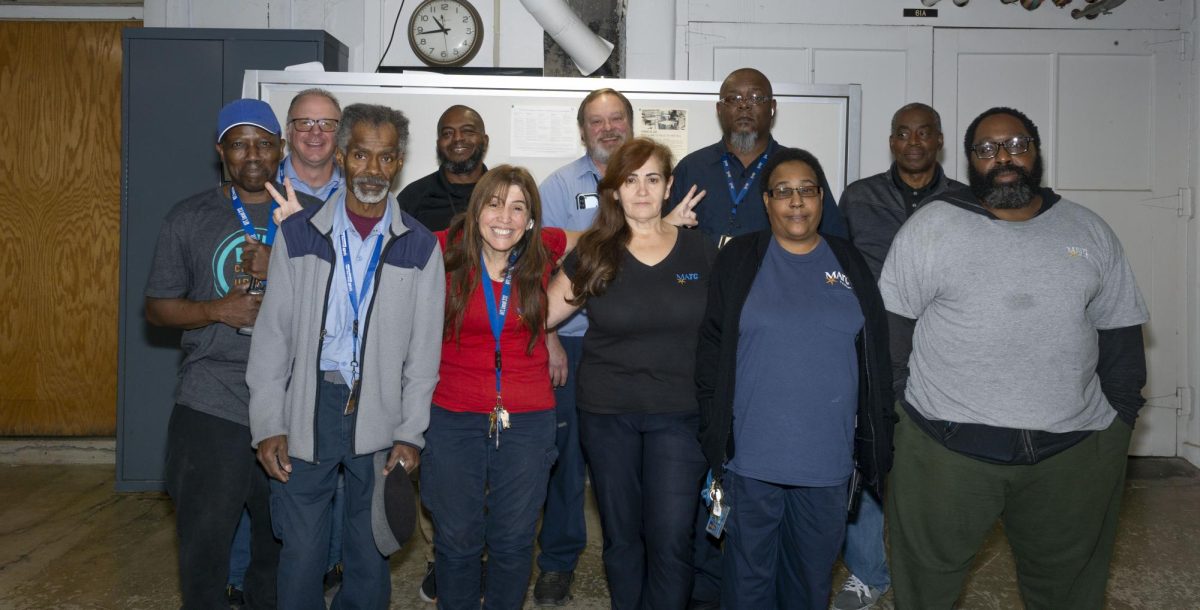 Downtown Campus 1st shift Facilities staff members (back row, left to right): Jeff Davis, David Sherrill (Director), Mike Clay (Manager), Dean Zimmerman, Alvin Ray, Clifford Watson, (front row, left to right): Jerry Key, Edna Prochaska, Irene Nimmer, Dorinda Clark, Michael Clinton. Names of those who aren't in the picture: Angela Kyles, Dewayne Lee, Quentin Trice, Joe Hines, Derrow Hynes, Forshe Vushn, Robert Insram, Sheryl Lawson, David Mahnke, Yoshiko Janzen, Jame Binseheimer.