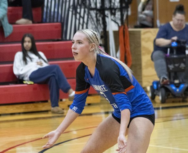 Outside Hitter #3 Sam Seihr waiting on a serve. 