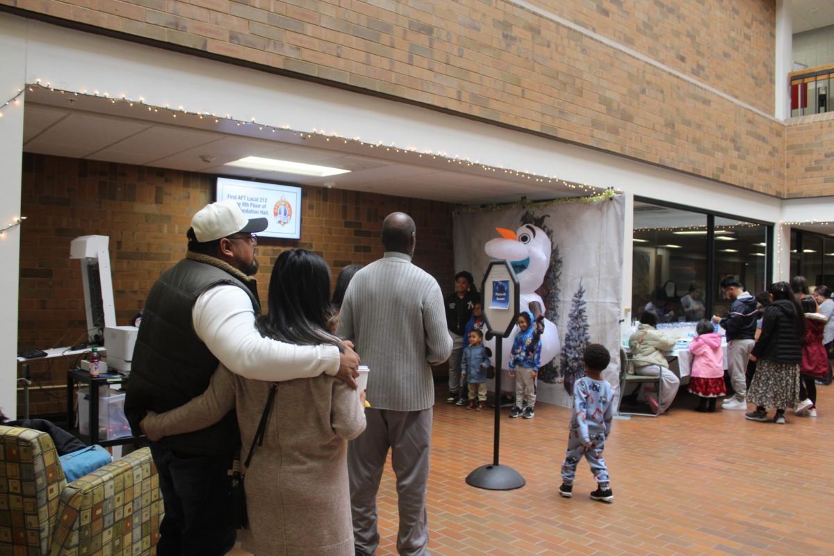 People line up to have a picture with Olaf.