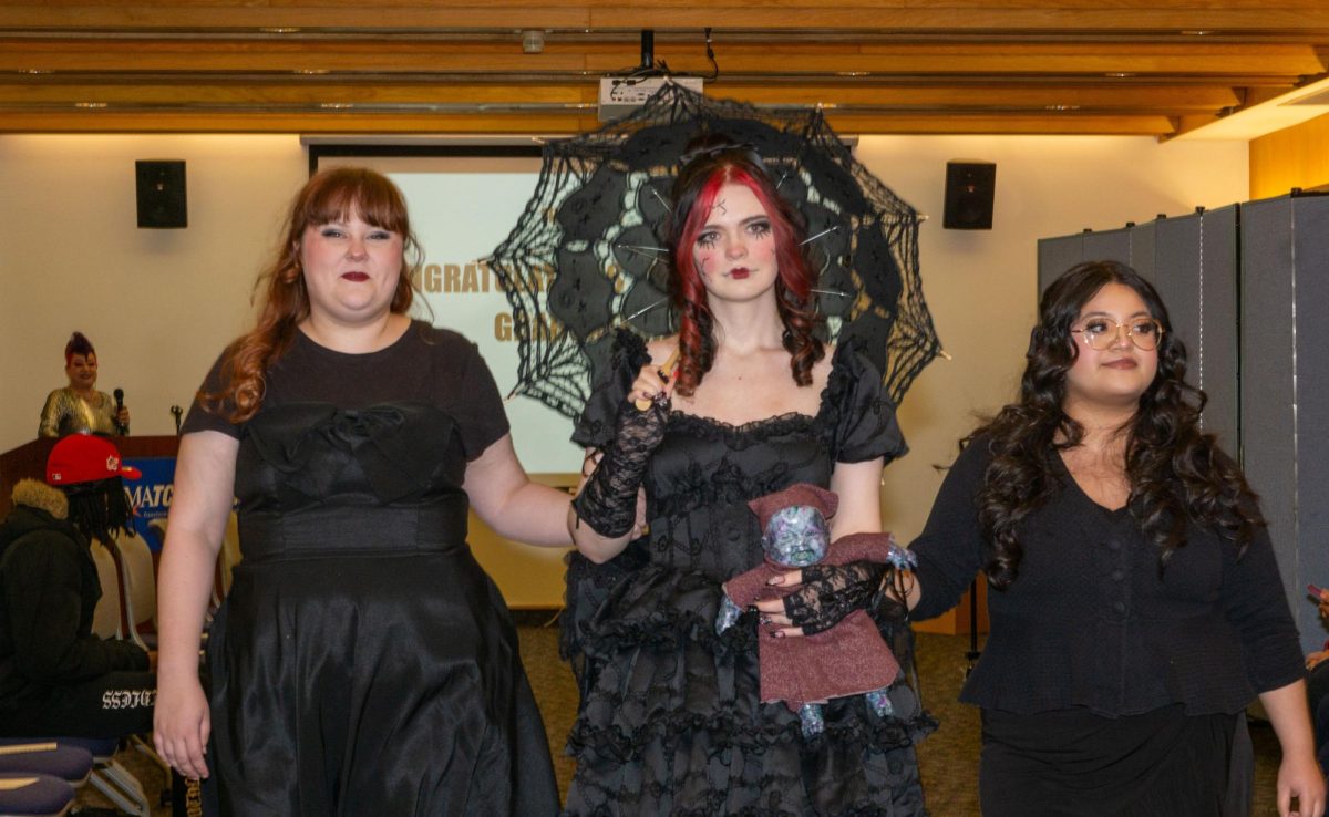 Advanced cosmetology graduates Juana Chavez and Cassandra Schneider do a final walk with their model for their “Victorian Doll” theme   MATC’sThe Edge: A Beauty Showcase. December 11, 2024.