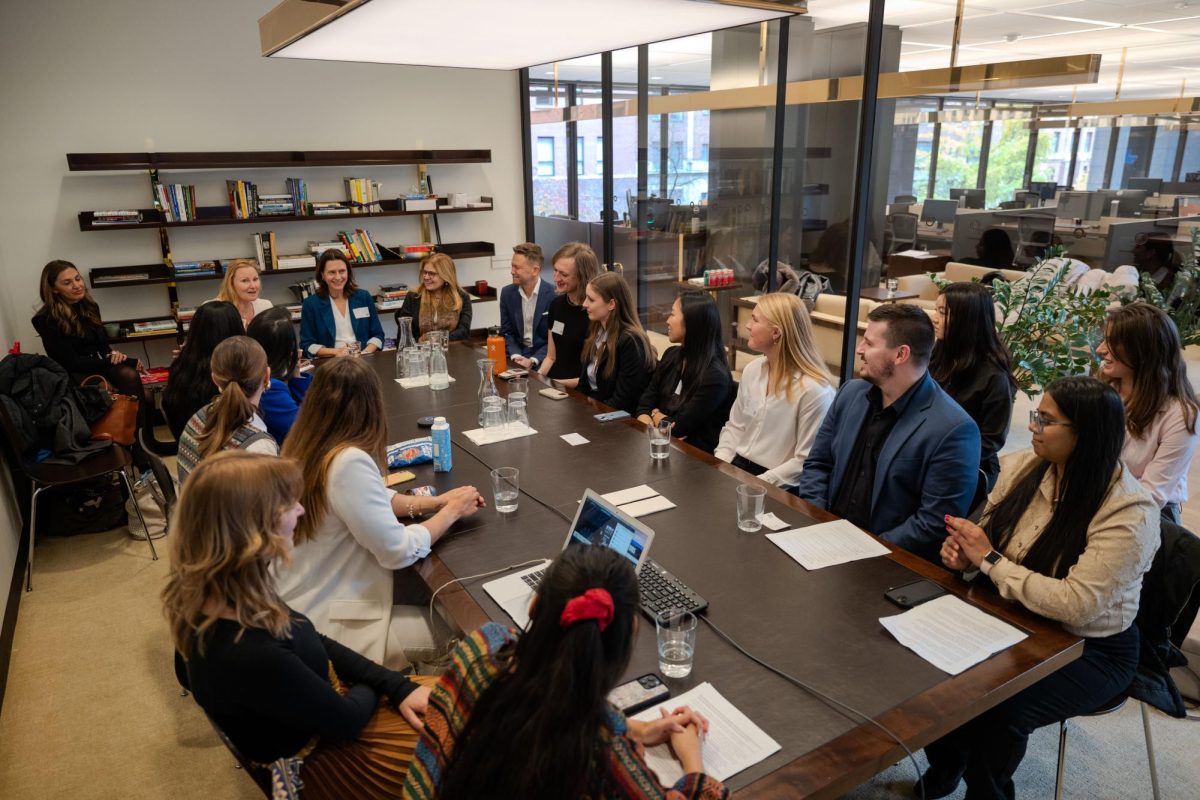 A group of young professionals, including three MATC students, listen attentively as UN Officials introduce themselves at the head of the table. (In order from left to right - Jayashri Wyatt, Chief of Education Outreach at UN Department of Global Communications; Martina Donlon, Chief of the Climate Section at the UN Department of Global Communications; Paloma Escudero, Head of UN Women’s Global Communication and Advocacy team; David Ohana, UN Chief Communications and Marketing Officer.) Photo provided by Unite2030.