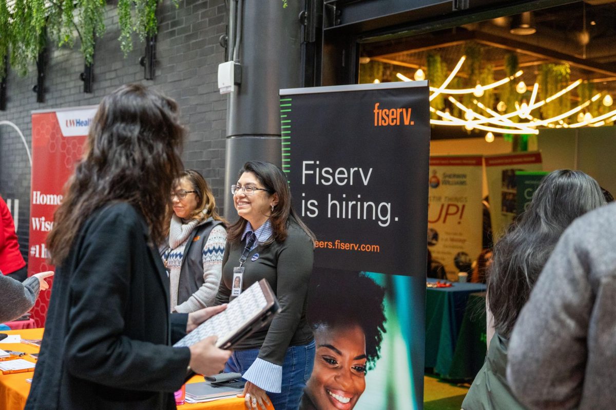 Students pick up materials and speak to the wide variety of employers at the Wisconsin Private Colleges Career Consortium (WIPCCC) Career Expo at 3rd Street Market Hall. Milwaukee WI. February 19, 2025. 