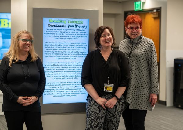 (from left to right) Artists Roxane Mayeur, Stephanie Bartz, and Ann Baer speak about their works and inspirations during the opening night of the “Breaking Barriers, Women in the Workforce” gallery showcase March 13, 2025