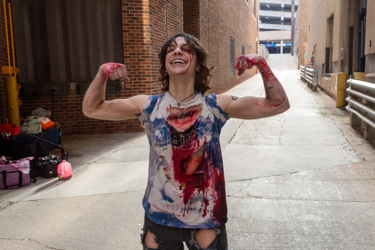 MATC Photography student Mel Pipito poses after getting special effects makeup put on her for a final project in a Photojournalism class.  