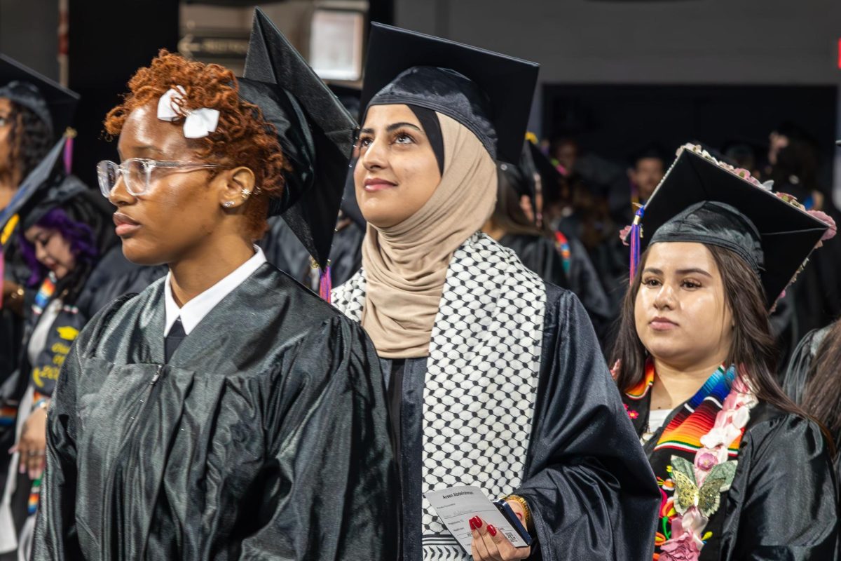 Three graduates line up at MATC's Spring 2025 Commencement.