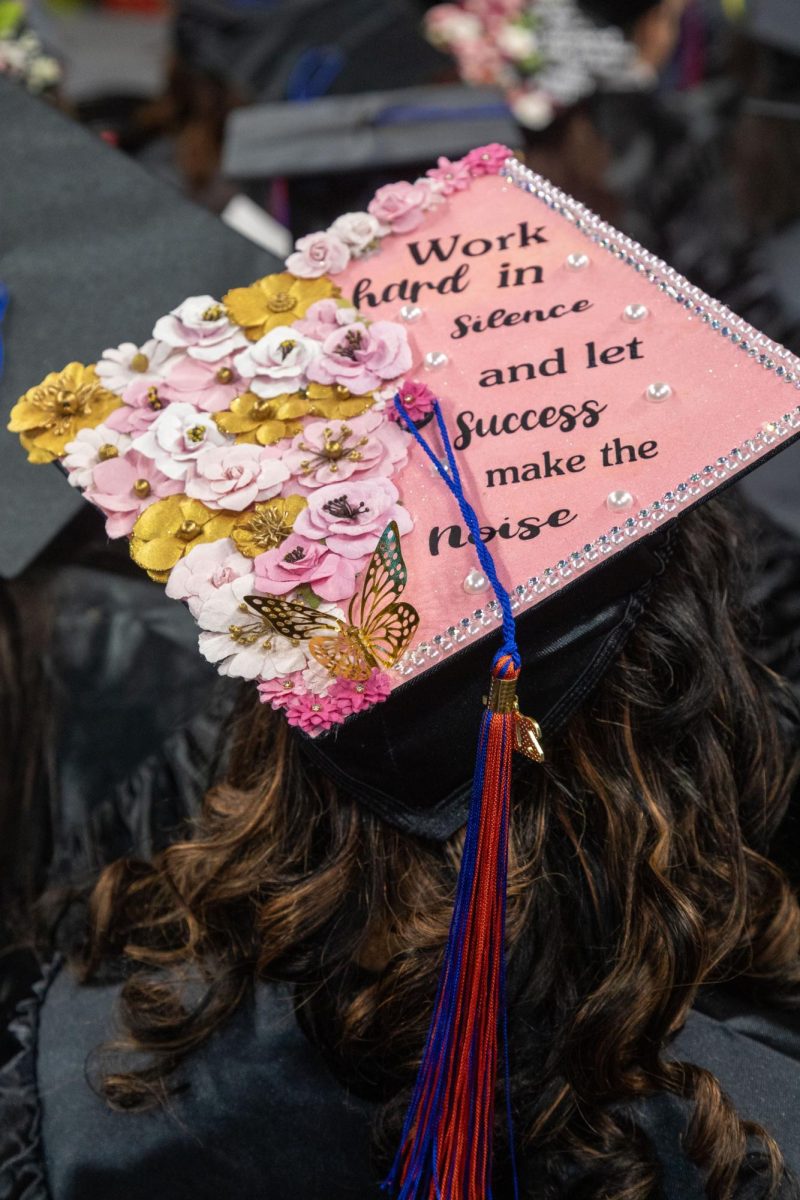Many students decorate their caps to stand out in the crowd of black caps and gowns at graduation.
