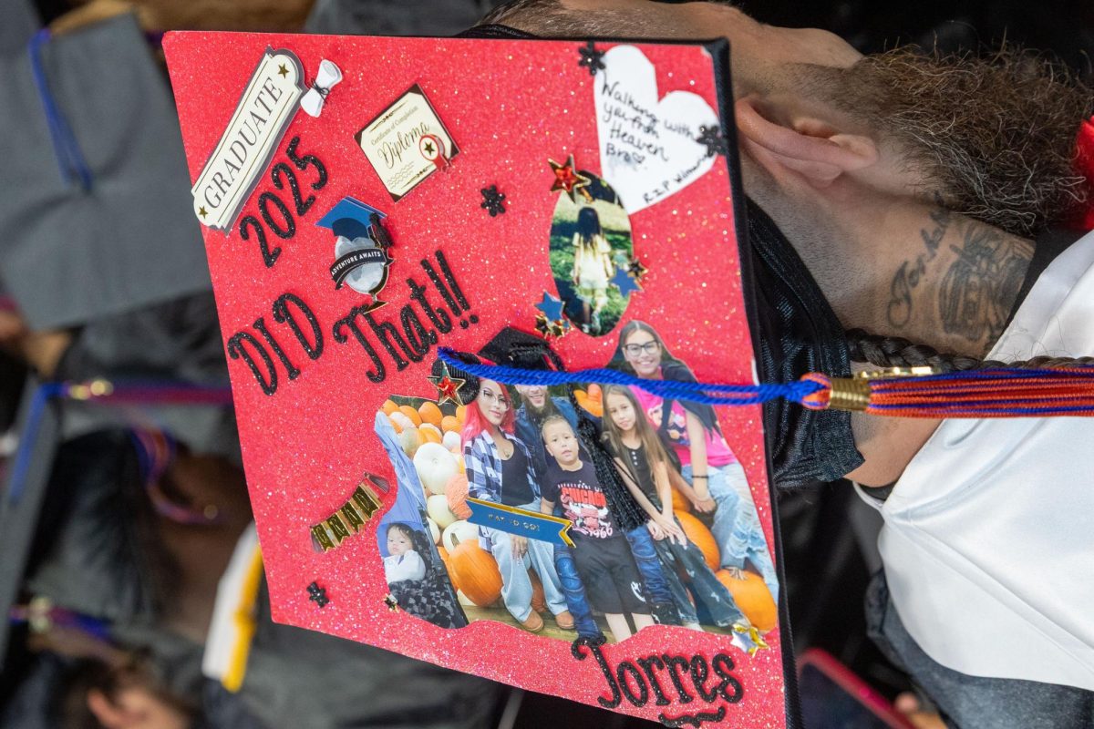 Photos of loved ones don the cap of an MATC student on Sunday, May 17, 2025.