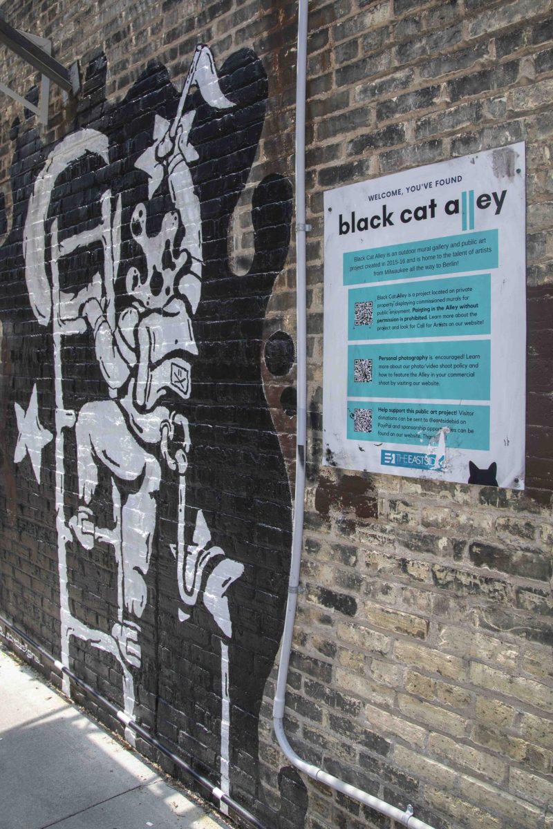 Visitors are welcomed to Black Cat Alley on Milwaukee's East Side behind the Oriental Theatre.