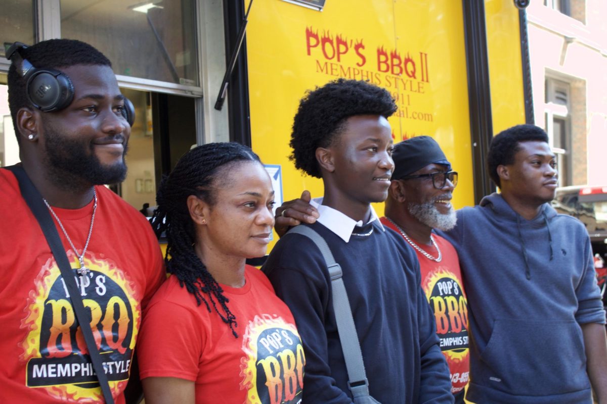 Pop's BBQ food truck workers pose for a photo after Wednesday's Welcome Back event for MATC students.