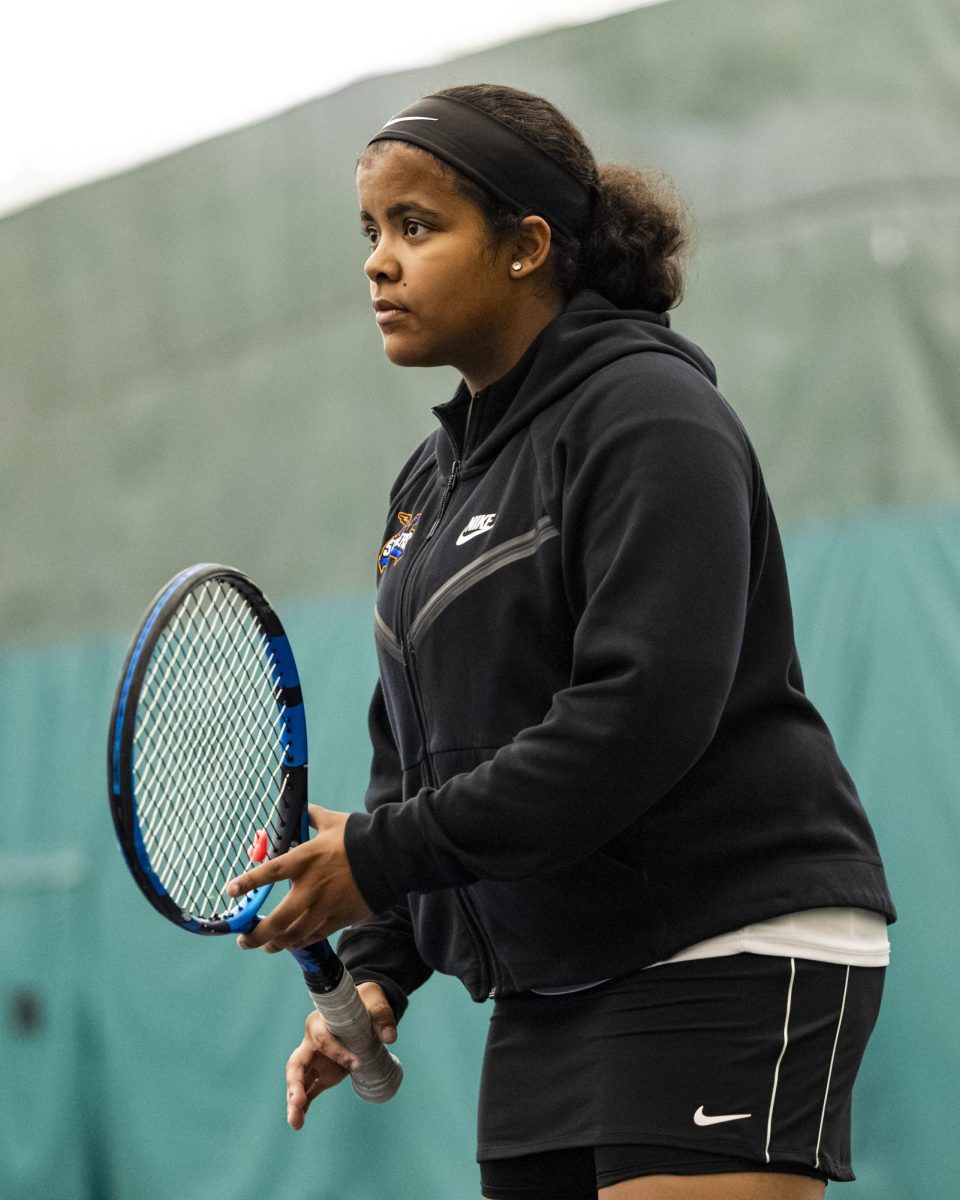 Freshman Ellea Gleesing gets set to receive a serve from Waubonsee Community College in doubles on September 20, 2025.