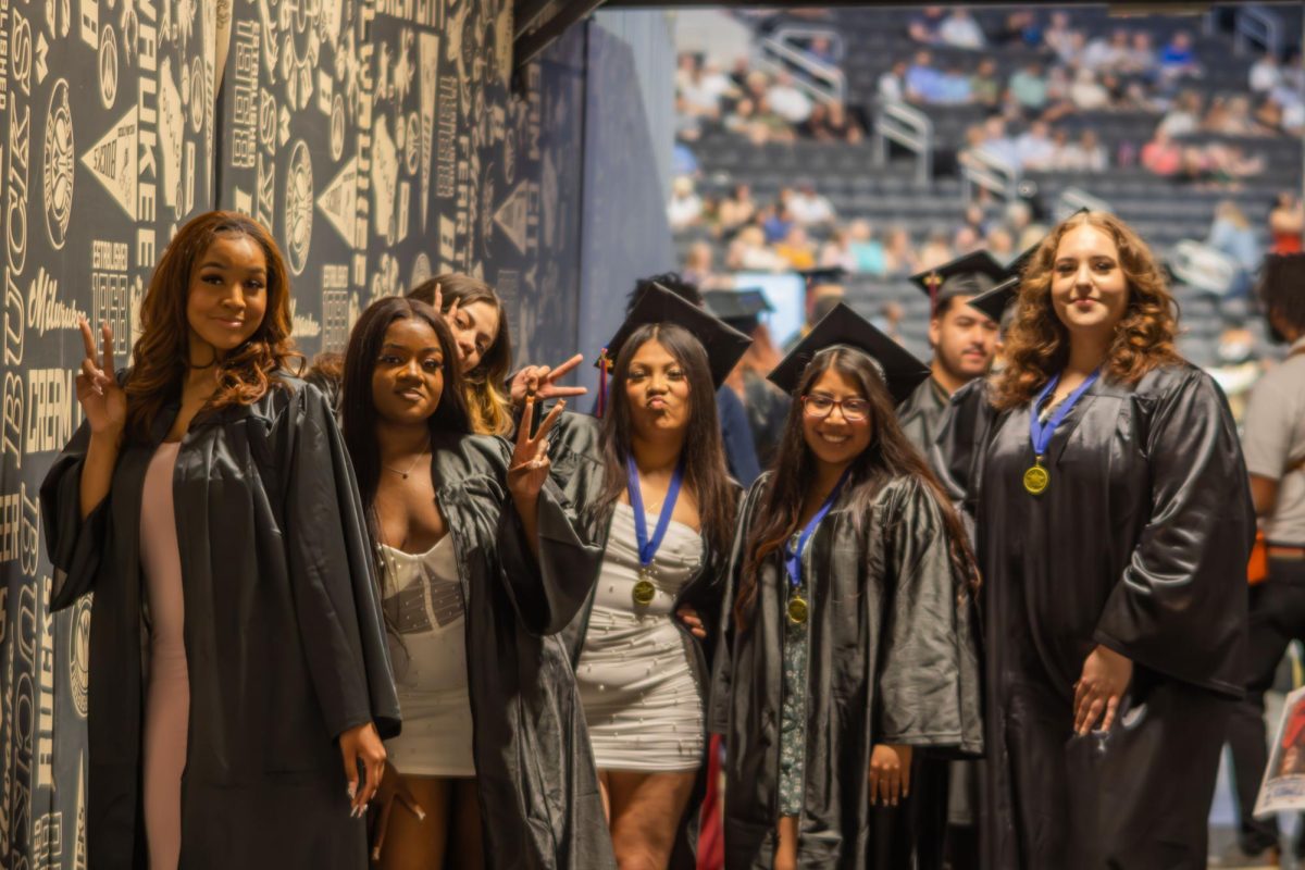 Fall 2024 Graduates pose at MATC's Commencement ceremony
