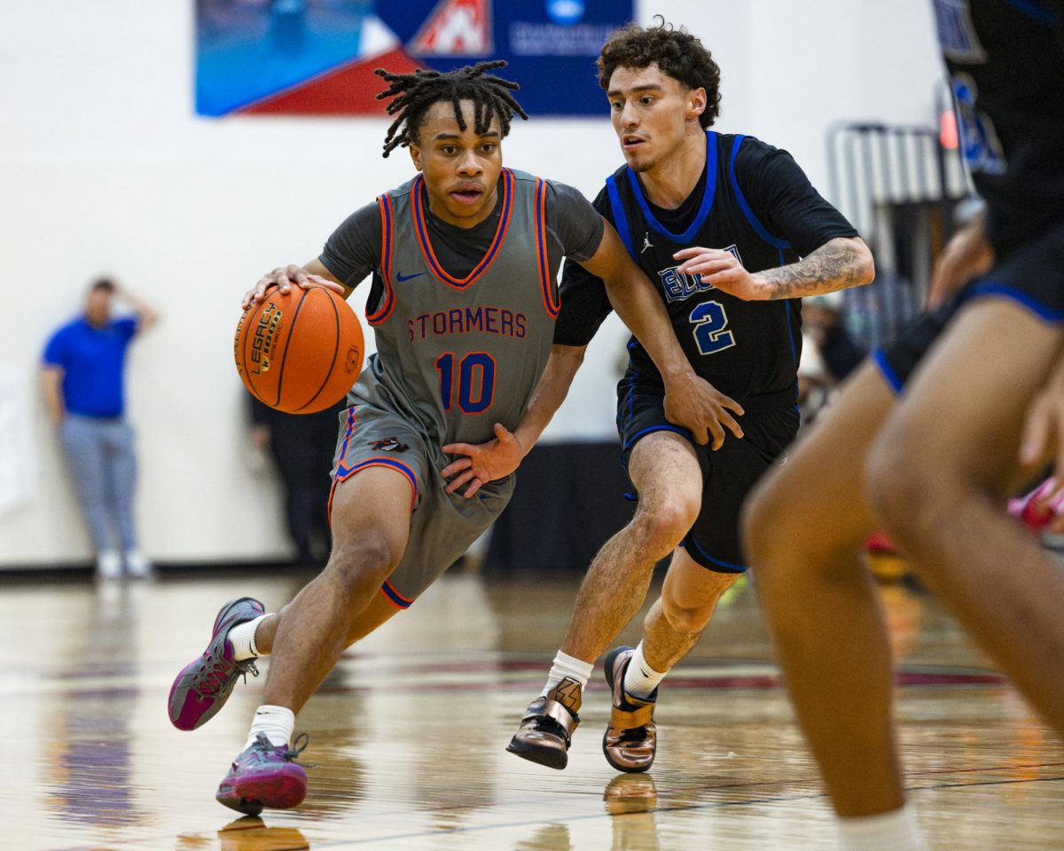 Sophomore point guard Raydelh Boutin takes his dribble past his defender in the home opener win (131-76) against Elgin Community College on November 13, 2025. 